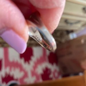 A man’s pinky ring